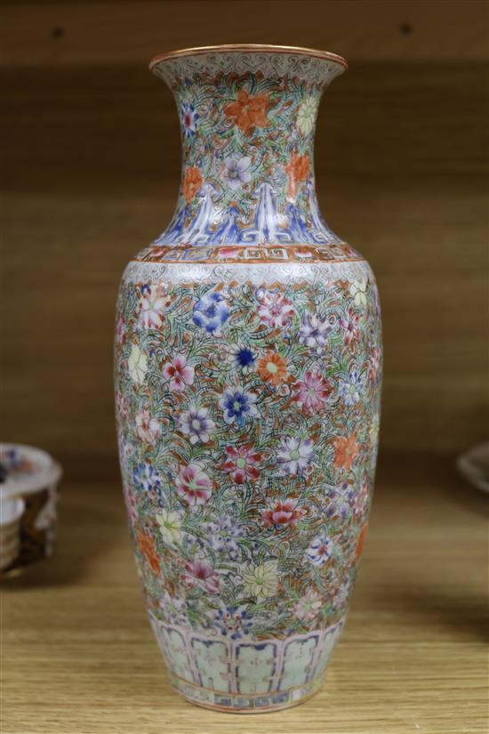 A Chinese famille rose small millefleur vase, Republic period, bearing a Qianlong mark height 23cm